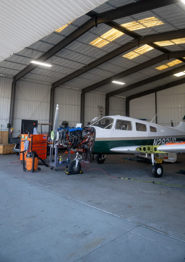 Aircraft maintenance team working in a San Diego hangar
