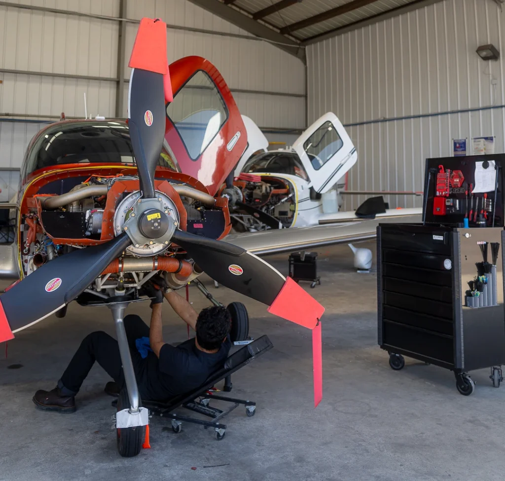 Aircraft maintenance team working in a San Diego hangar