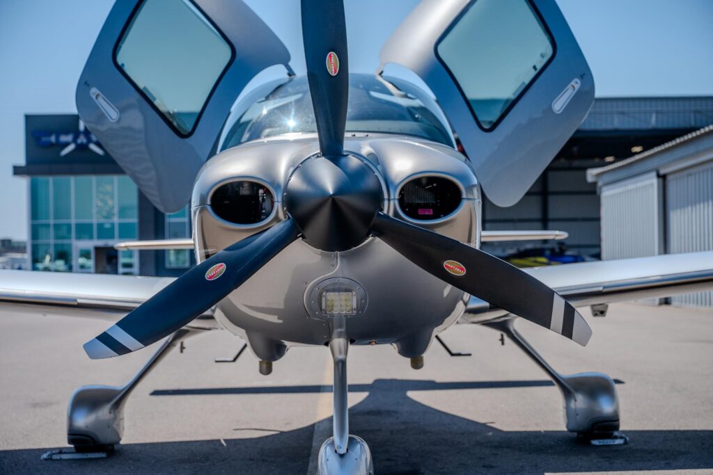 Front view of a 2019 Cirrus SR22 G6 showing the cowling and propeller